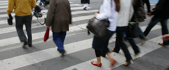 Pedestrians walking on a crosswalk